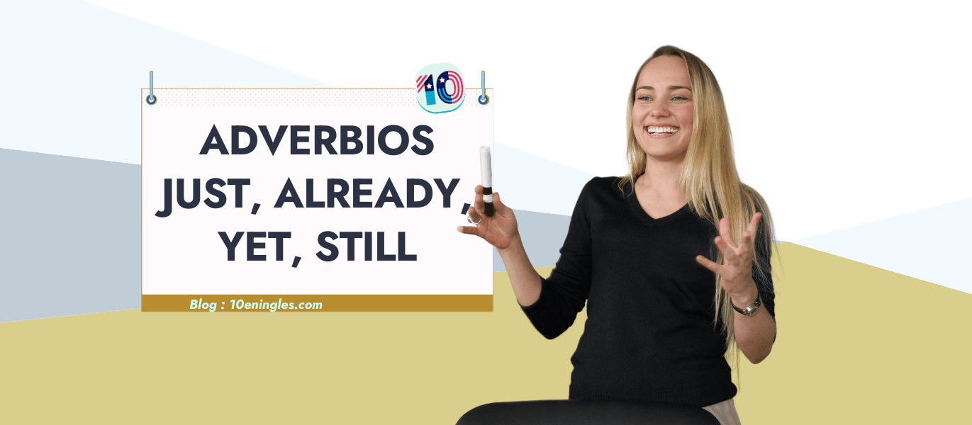 Mujer sonriendo sosteniendo un rotulador frente a un cartel con la frase "Adverbios Just, Already, Yet, Still".